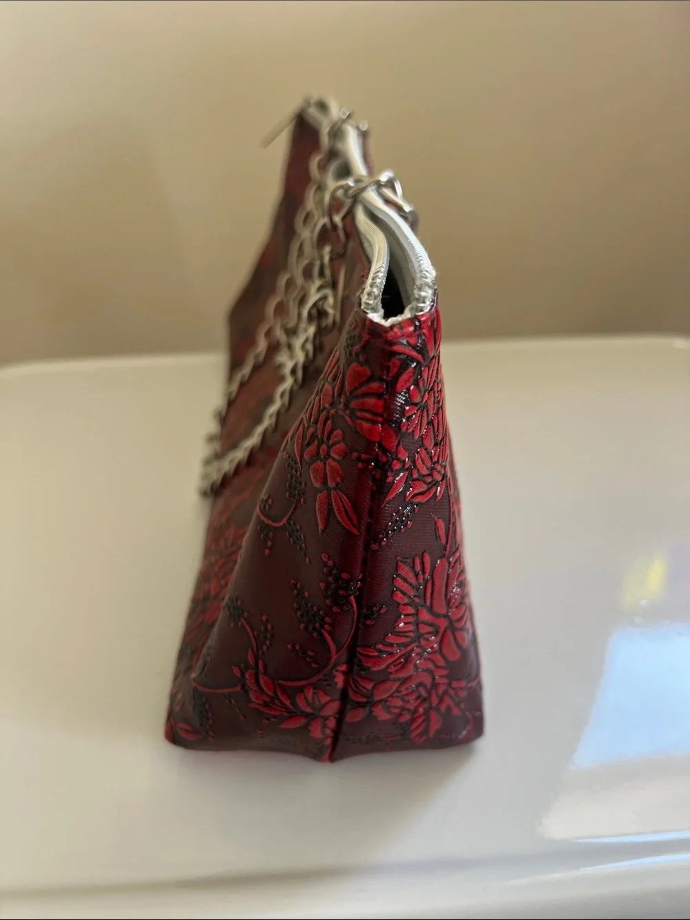 Iceware Red Floral Embossed Chain-Handle Clutch.